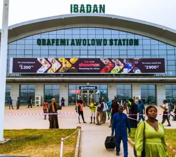 A billboard advertising Showmax 2.0 at the entrance of the Ibadan train station