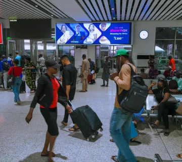 A billboard advertising Showmax in the waiting room of the train station